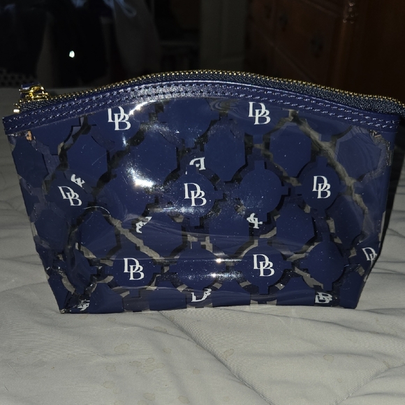 Dooney & Bourke Handbags - Dooney & Bourke Rare Blue Patterned Cosmetic Case Clear